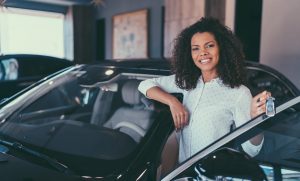Lending for Medical Students 6 young woman buying new car iStock 1039931504 loans for medical students