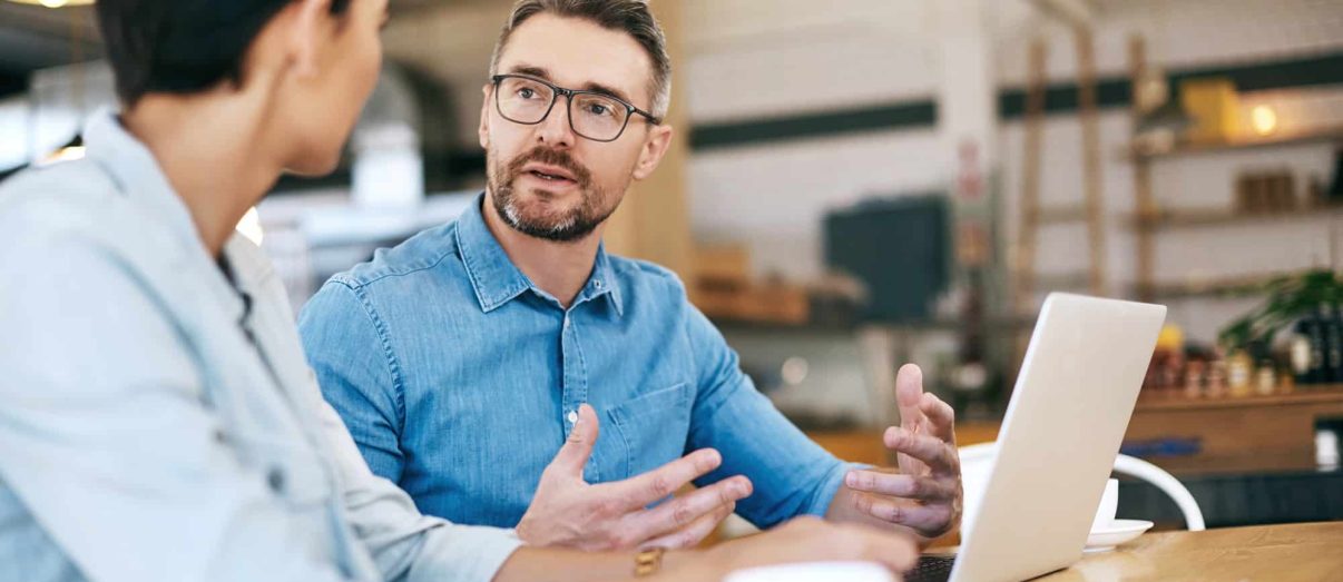 Tax and Accounting for Private Practice 1 accountants for medical practitioners; accountants for doctors; tax accountant siting with medical professional client discussing tax and accounting